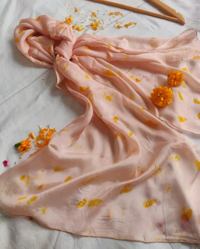 Hand crafted silk scarf printed with marigold petals